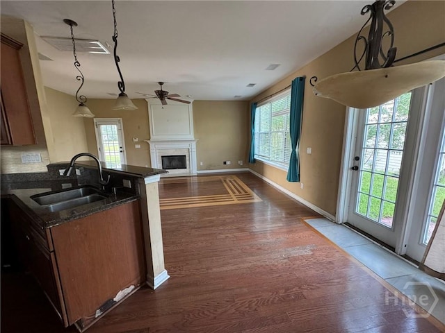 8 Fairgreen St, Savannah, GA 31407 - kitchen featuring ceiling fan, dark wood-style flooring, and healthy amount of natural light