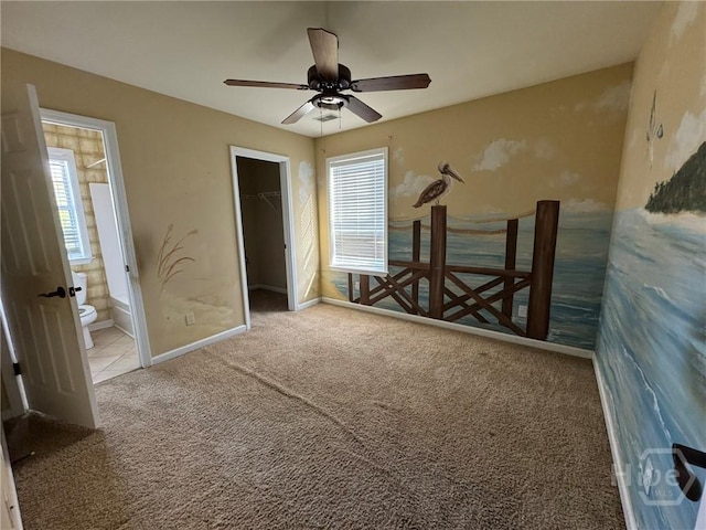 8 Fairgreen St, Savannah, GA 31407 - unfurnished bedroom with carpet floors, a walk in closet, a ceiling fan, and ensuite bathroom