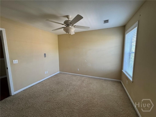8 Fairgreen St, Savannah, GA 31407 - spare room featuring healthy amount of natural light, carpet, and a ceiling fan