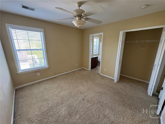 8 Fairgreen St, Savannah, GA 31407 - unfurnished bedroom featuring a closet, light carpet, ceiling fan, and ensuite bathroom