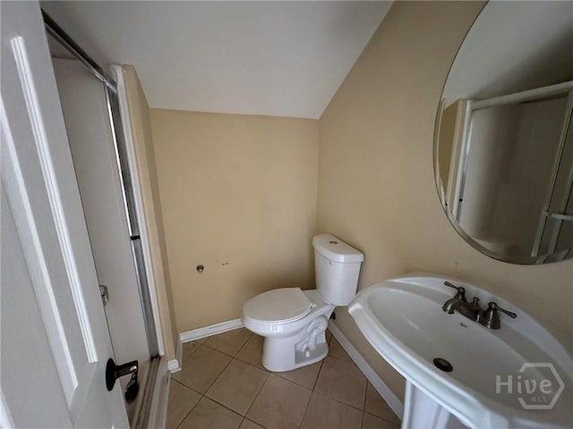 8 Fairgreen St, Savannah, GA 31407 - bathroom with tile patterned flooring and lofted ceiling