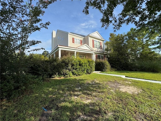8 Fairgreen St, Savannah, GA 31407 - traditional-style home with a chimney and a front yard