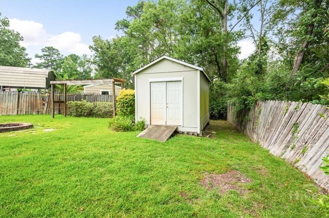 375 Hermitage Dr, Richmond Hill, GA 31324 - view of shed with a fenced backyard