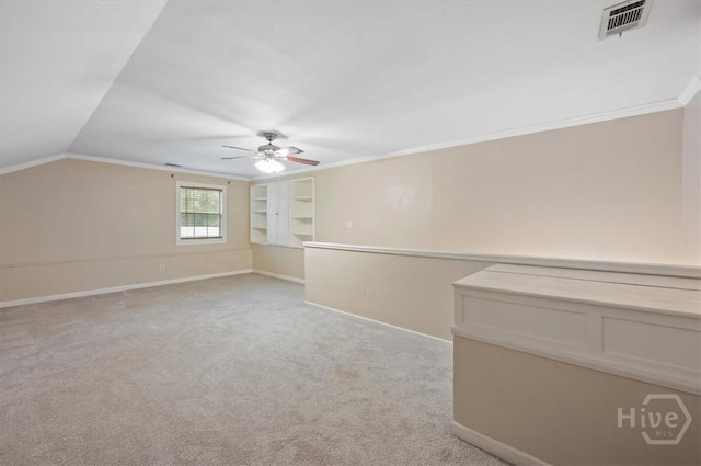 375 Hermitage Dr, Richmond Hill, GA 31324 - unfurnished room with a ceiling fan, light colored carpet, lofted ceiling, and crown molding