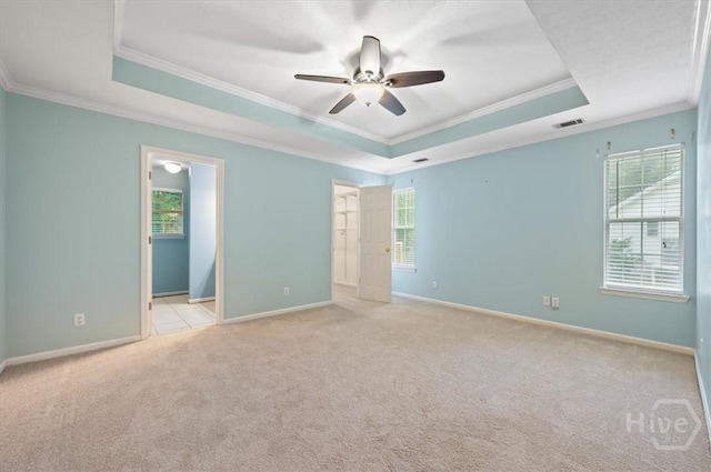 375 Hermitage Dr, Richmond Hill, GA 31324 - unfurnished bedroom featuring a raised ceiling, ornamental molding, carpet, and a ceiling fan