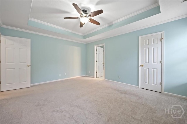 375 Hermitage Dr, Richmond Hill, GA 31324 - unfurnished bedroom featuring a raised ceiling, crown molding, carpet floors, and a ceiling fan
