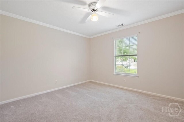 375 Hermitage Dr, Richmond Hill, GA 31324 - spare room with light colored carpet, crown molding, and a ceiling fan