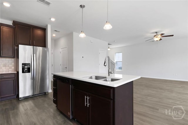 106 Brookline Dr, Savannah, GA 31407 - kitchen with stainless steel fridge, dishwashing machine, wood finished floors, ceiling fan, and light countertops
