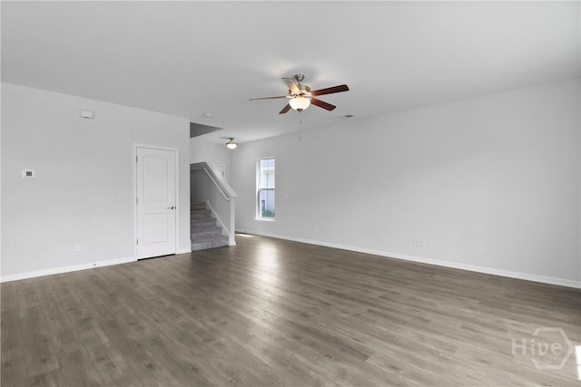 106 Brookline Dr, Savannah, GA 31407 - unfurnished living room with ceiling fan, stairway, and wood finished floors