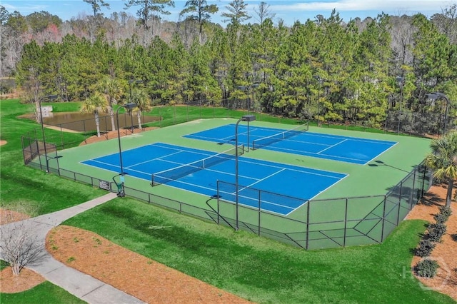 106 Brookline Dr, Savannah, GA 31407 - view of tennis court featuring a forest view