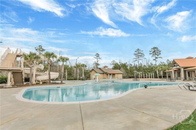 106 Brookline Dr, Savannah, GA 31407 - community pool featuring a patio and a water slide