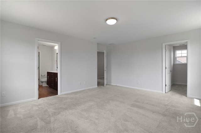 106 Brookline Dr, Savannah, GA 31407 - unfurnished bedroom featuring carpet flooring, a spacious closet, and ensuite bath