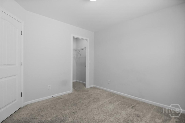 106 Brookline Dr, Savannah, GA 31407 - unfurnished bedroom featuring carpet flooring and a walk in closet