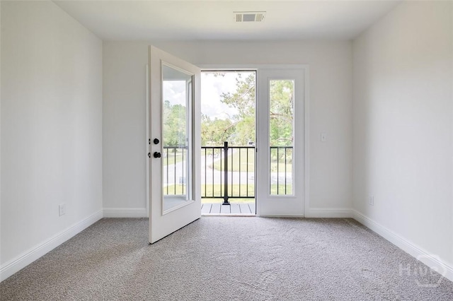 201 Dean Dr, Guyton, GA 31312 - empty room featuring healthy amount of natural light and carpet floors