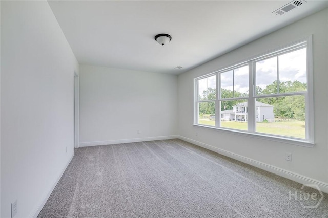 201 Dean Dr, Guyton, GA 31312 - spare room featuring light carpet and baseboards
