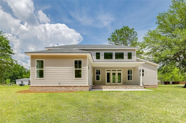 201 Dean Dr, Guyton, GA 31312 - back of house featuring french doors and a yard