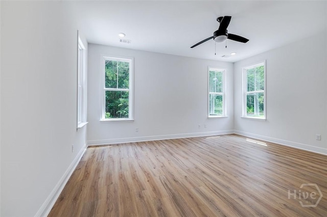 201 Dean Dr, Guyton, GA 31312 - unfurnished room with plenty of natural light, wood finished floors, and ceiling fan