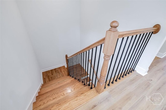 201 Dean Dr, Guyton, GA 31312 - stairway featuring wood finished floors