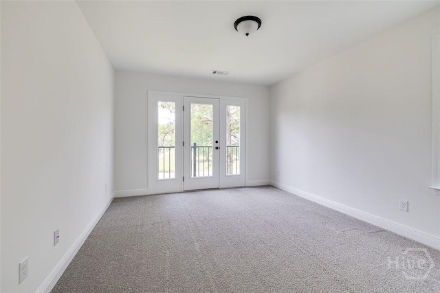 201 Dean Dr, Guyton, GA 31312 - spare room featuring light colored carpet and baseboards