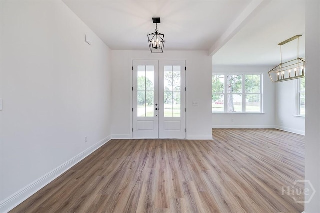 201 Dean Dr, Guyton, GA 31312 - entryway featuring a chandelier, wood finished floors, and french doors
