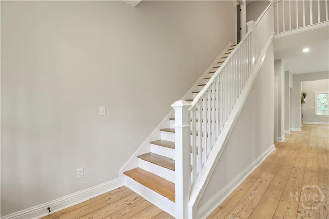 178 Cubbedge Dr, Rincon, GA 31326 - staircase with hardwood / wood-style flooring and a towering ceiling