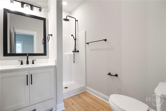 178 Cubbedge Dr, Rincon, GA 31326 - full bathroom with a shower, wood finished floors, and vanity