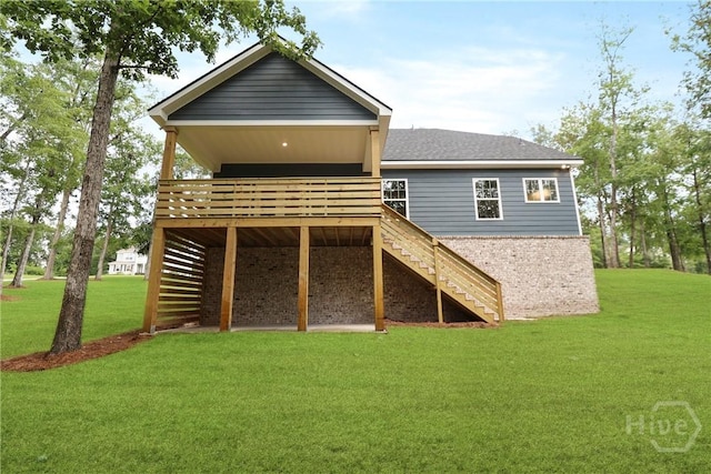 178 Cubbedge Dr, Rincon, GA 31326 - rear view of property with stairway, a deck, a lawn, and roof with shingles
