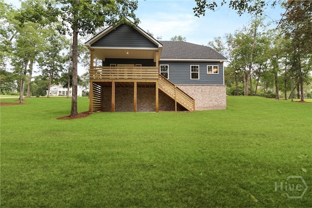 178 Cubbedge Dr, Rincon, GA 31326 - back of house with stairs, a lawn, a wooden deck, and roof with shingles