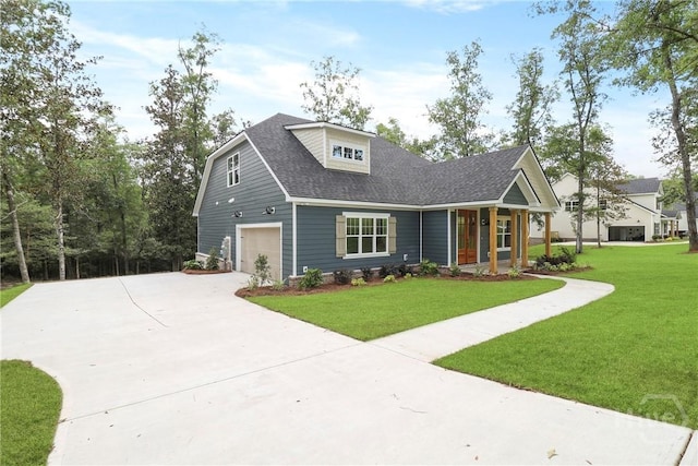 178 Cubbedge Dr, Rincon, GA 31326 - view of front of house with a front lawn, driveway, a garage, and roof with shingles