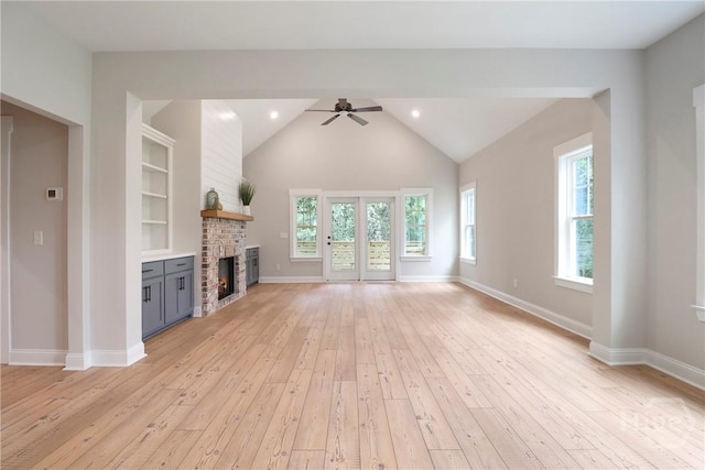178 Cubbedge Dr, Rincon, GA 31326 - unfurnished living room with a fireplace, light wood-style flooring, healthy amount of natural light, a ceiling fan, and recessed lighting