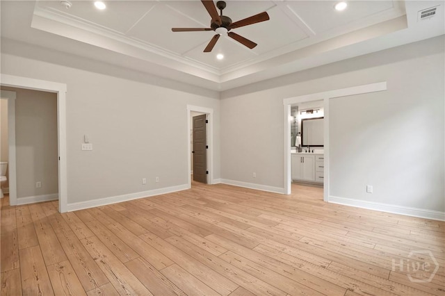 178 Cubbedge Dr, Rincon, GA 31326 - spare room with a raised ceiling, ceiling fan, crown molding, light wood-style floors, and recessed lighting