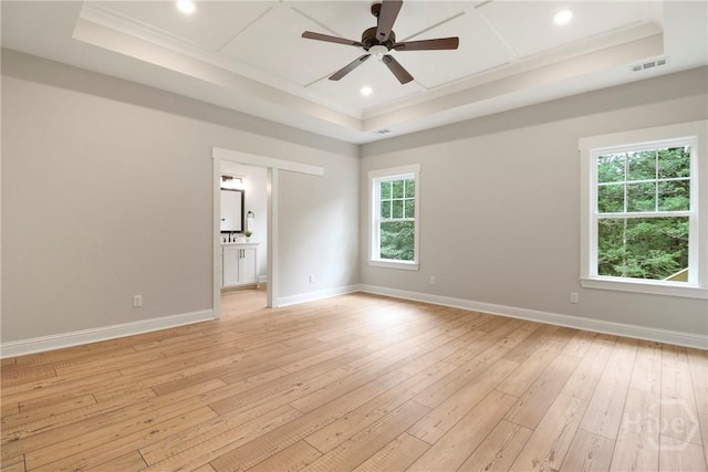 178 Cubbedge Dr, Rincon, GA 31326 - empty room with a tray ceiling, ornamental molding, light wood-type flooring, ceiling fan, and recessed lighting