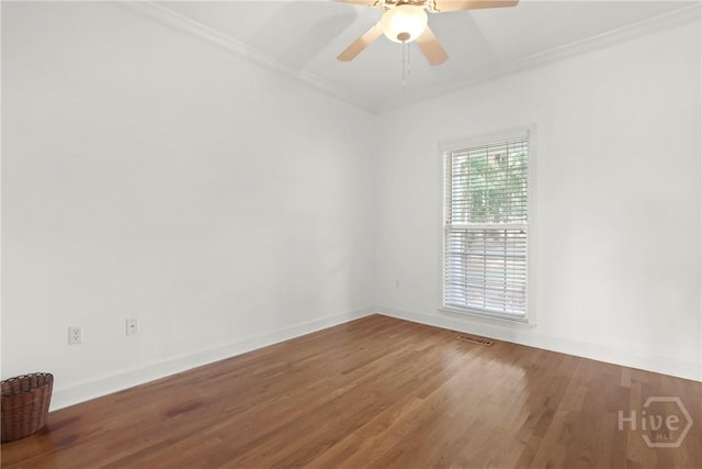 271 Davis Rd, Richmond Hill, GA 31324 - spare room with ornamental molding, wood finished floors, and a ceiling fan