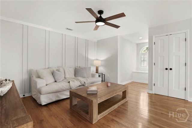 271 Davis Rd, Richmond Hill, GA 31324 - living area with a ceiling fan and wood finished floors