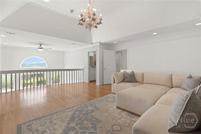 271 Davis Rd, Richmond Hill, GA 31324 - living area featuring wood finished floors, a ceiling fan, a chandelier, recessed lighting, and crown molding