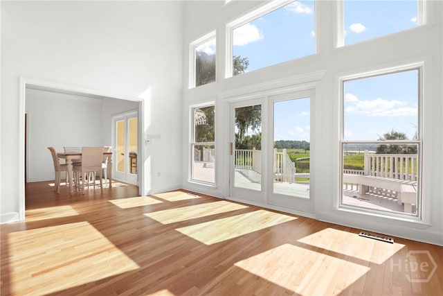 271 Davis Rd, Richmond Hill, GA 31324 - entryway featuring a high ceiling and wood finished floors