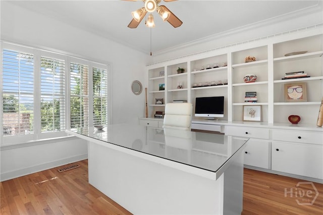 271 Davis Rd, Richmond Hill, GA 31324 - unfurnished office with ceiling fan, light wood-type flooring, and crown molding
