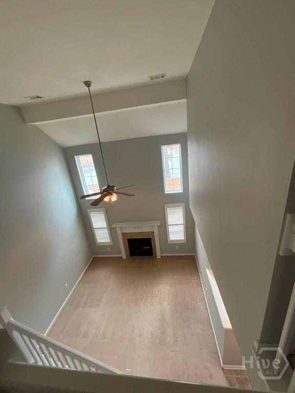 230 Opus Ct, Pooler, GA 31322 - unfurnished living room with a ceiling fan, a fireplace, and a high ceiling