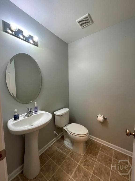 230 Opus Ct, Pooler, GA 31322 - half bath with toilet and tile patterned flooring
