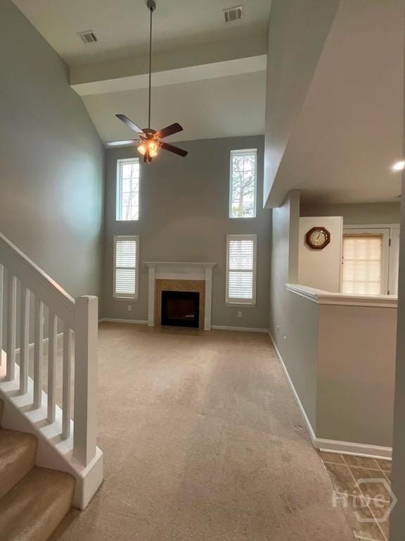 230 Opus Ct, Pooler, GA 31322 - unfurnished living room featuring high vaulted ceiling, a ceiling fan, stairway, carpet flooring, and a fireplace