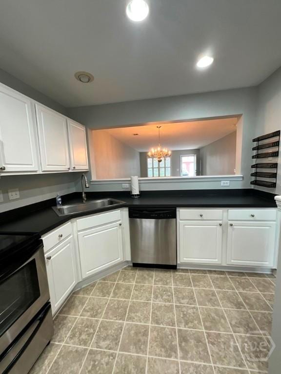 230 Opus Ct, Pooler, GA 31322 - kitchen with stainless steel appliances, a chandelier, white cabinets, and recessed lighting