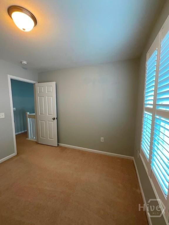 230 Opus Ct, Pooler, GA 31322 - spare room with light carpet and a smoke detector