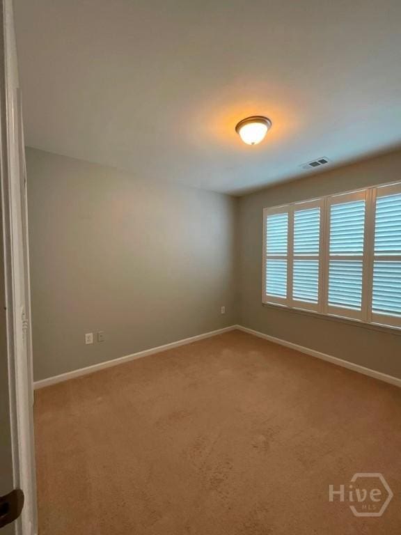 230 Opus Ct, Pooler, GA 31322 - empty room with carpet and baseboards