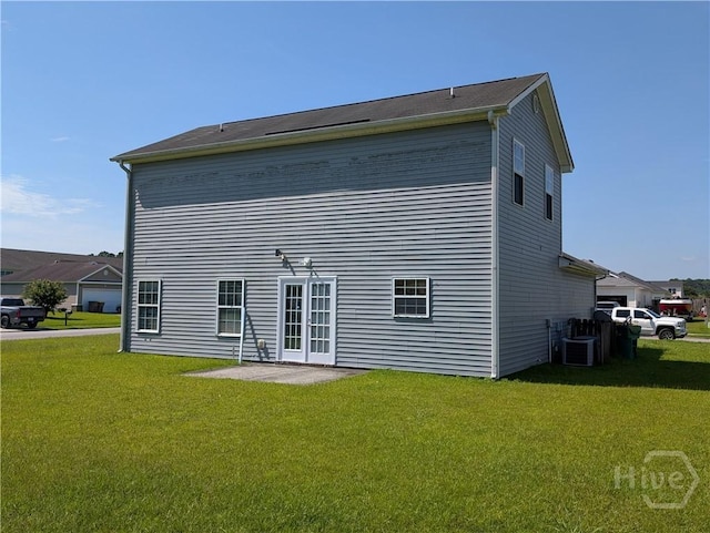 10 Evergreen Oak Dr, Richmond Hill, GA 31324 - back of house with a lawn
