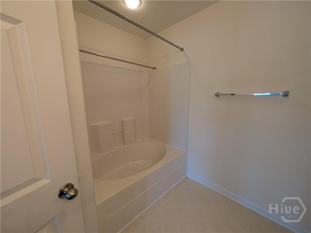 10 Evergreen Oak Dr, Richmond Hill, GA 31324 - bathroom with shower / bathtub combination and tile patterned floors