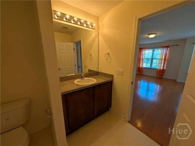 10 Evergreen Oak Dr, Richmond Hill, GA 31324 - half bathroom with vanity and wood finished floors