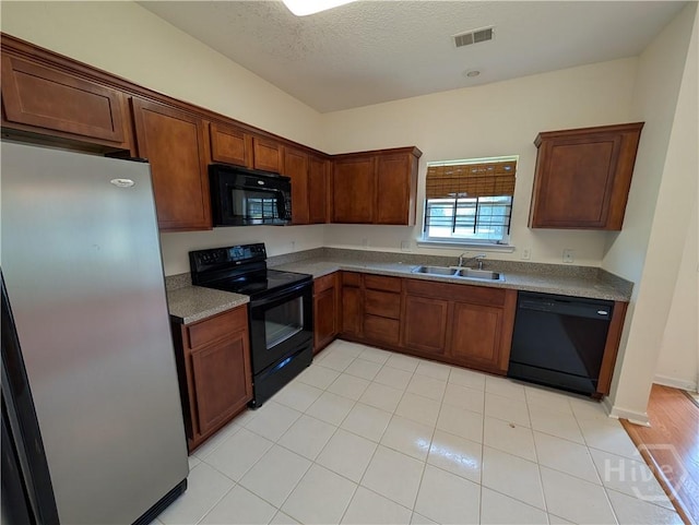 10 Evergreen Oak Dr, Richmond Hill, GA 31324 - kitchen featuring black appliances and a sink