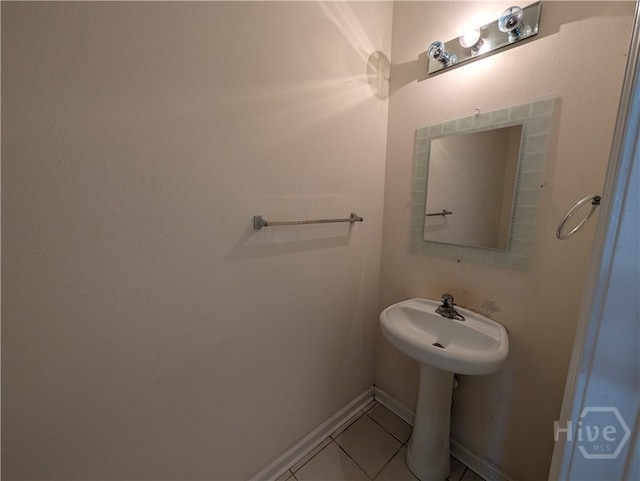 10 Evergreen Oak Dr, Richmond Hill, GA 31324 - bathroom featuring tile patterned floors and baseboards