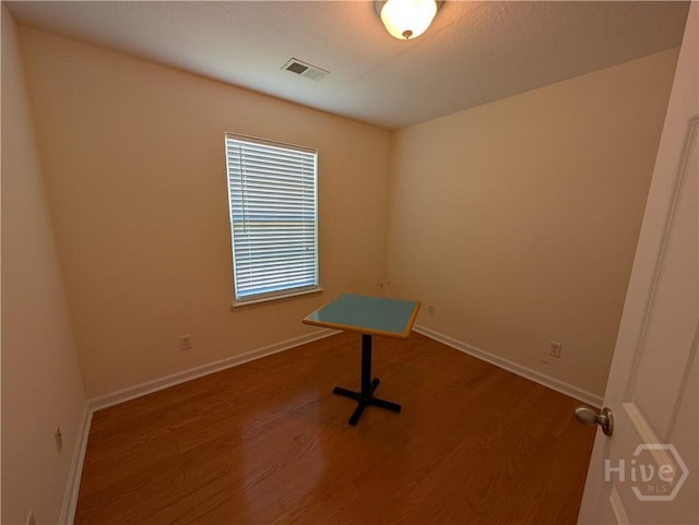 10 Evergreen Oak Dr, Richmond Hill, GA 31324 - spare room featuring wood finished floors and baseboards