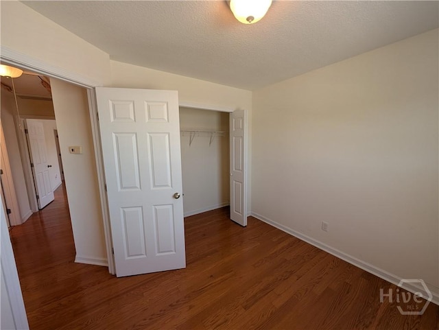 10 Evergreen Oak Dr, Richmond Hill, GA 31324 - unfurnished bedroom with wood finished floors and a closet